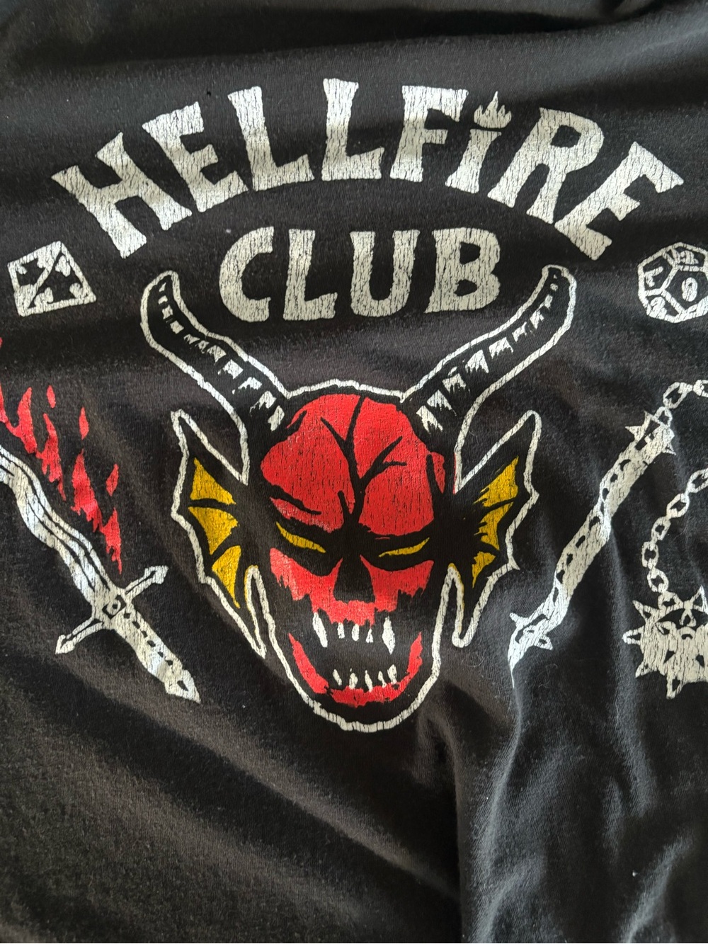 Netflix men’s Black Hellfire Club Graphic Tee with Red and Yellow Skull